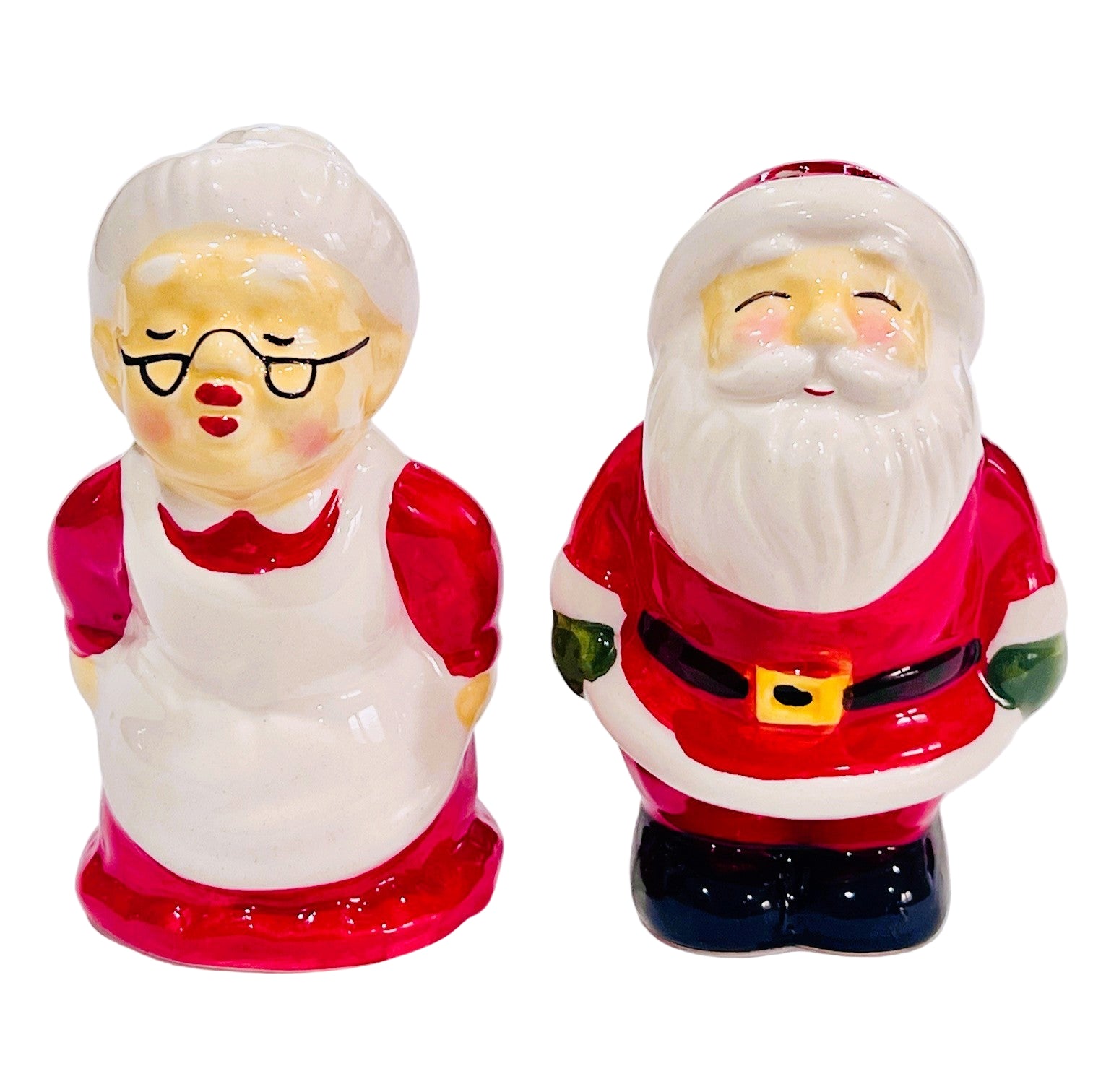 Vintage-style ceramic Santa Christmas figures of a woman and a man on a white background