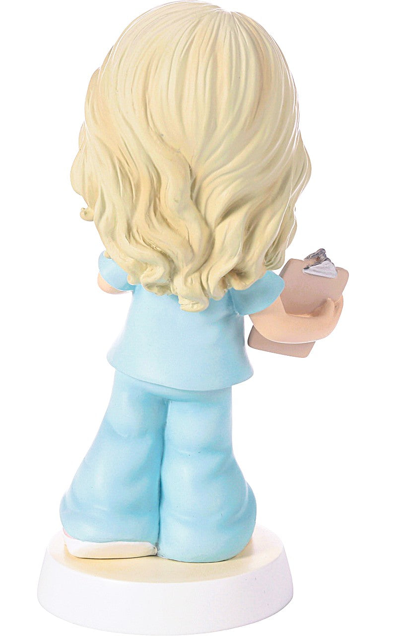 Precious Moments Nurse (Superhero in Scrubs) Figurine