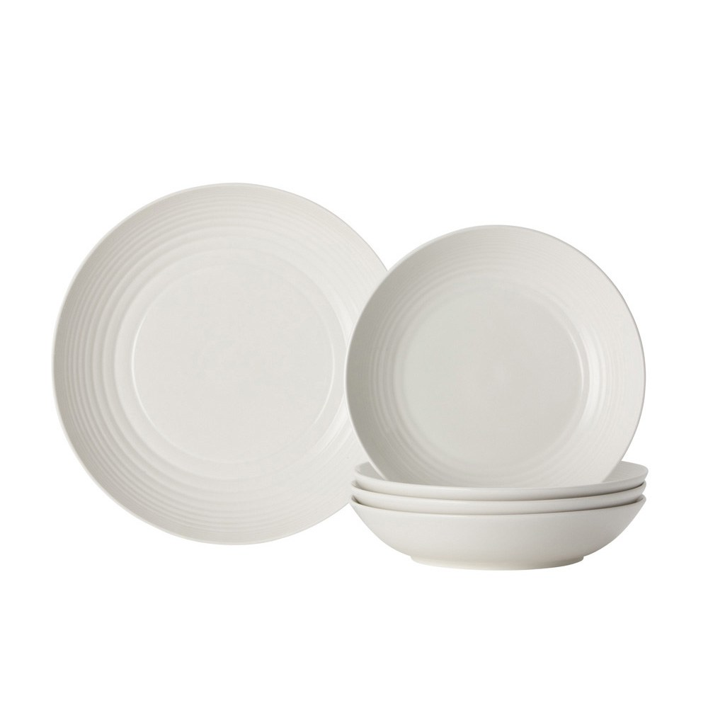 Set of white ceramic bowls on a white background