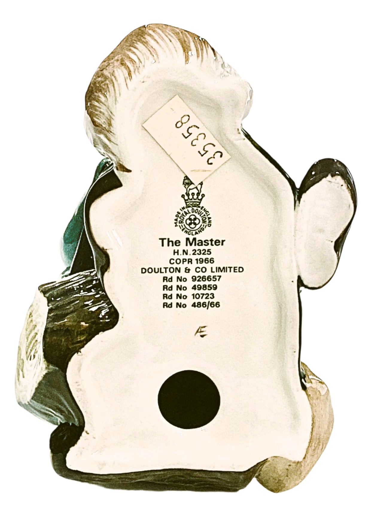 Doulton ceramic figure with a label on a white background