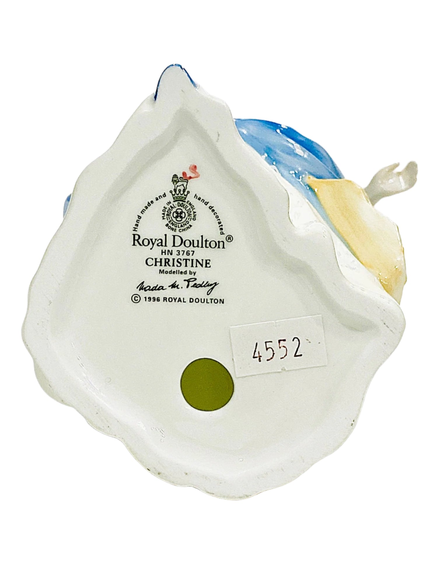 Royal Doulton Bonechina figurine on a white background