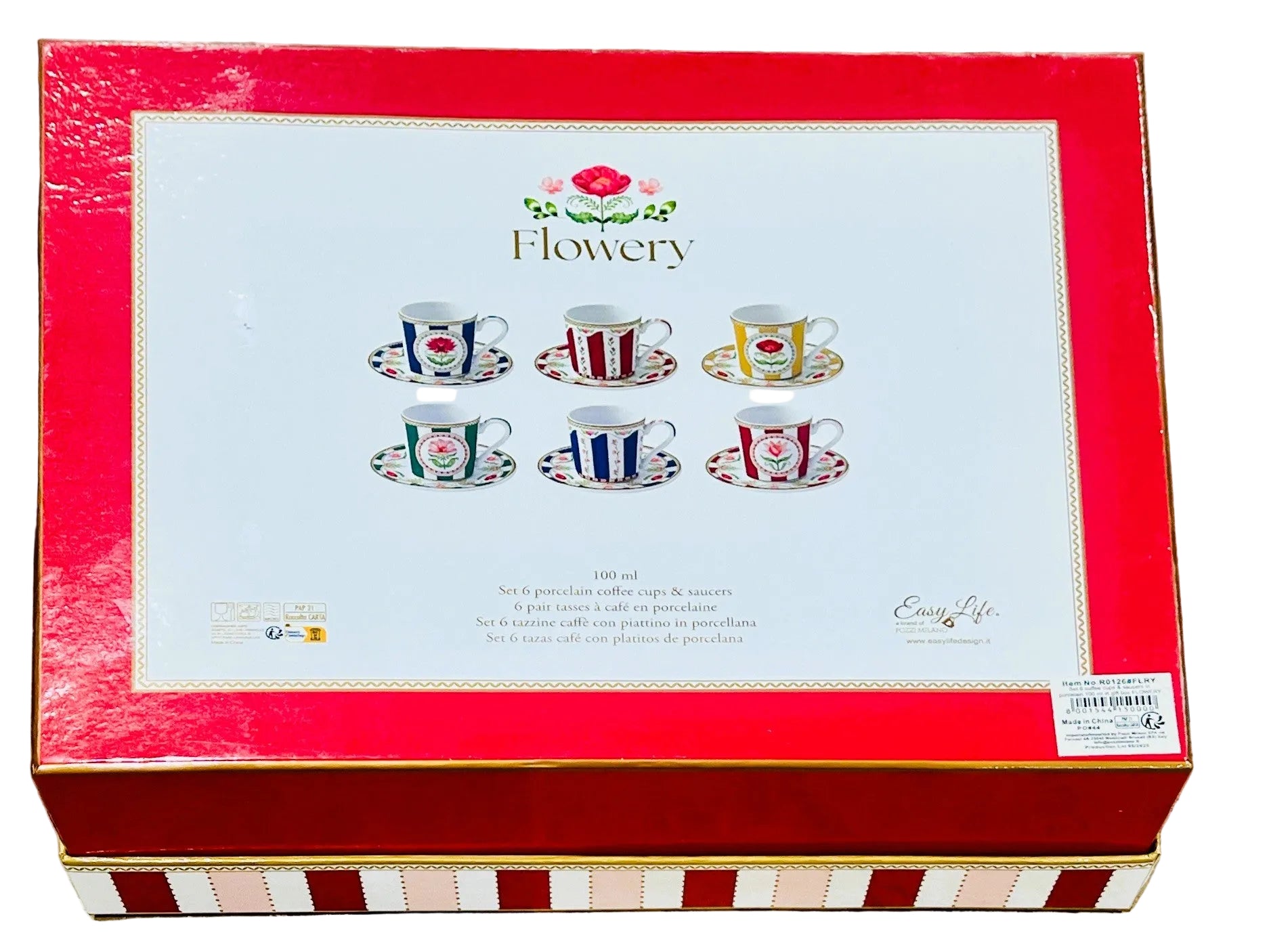 Gift box with 'Flowy' branding and illustrations of tea cups on a stone surface