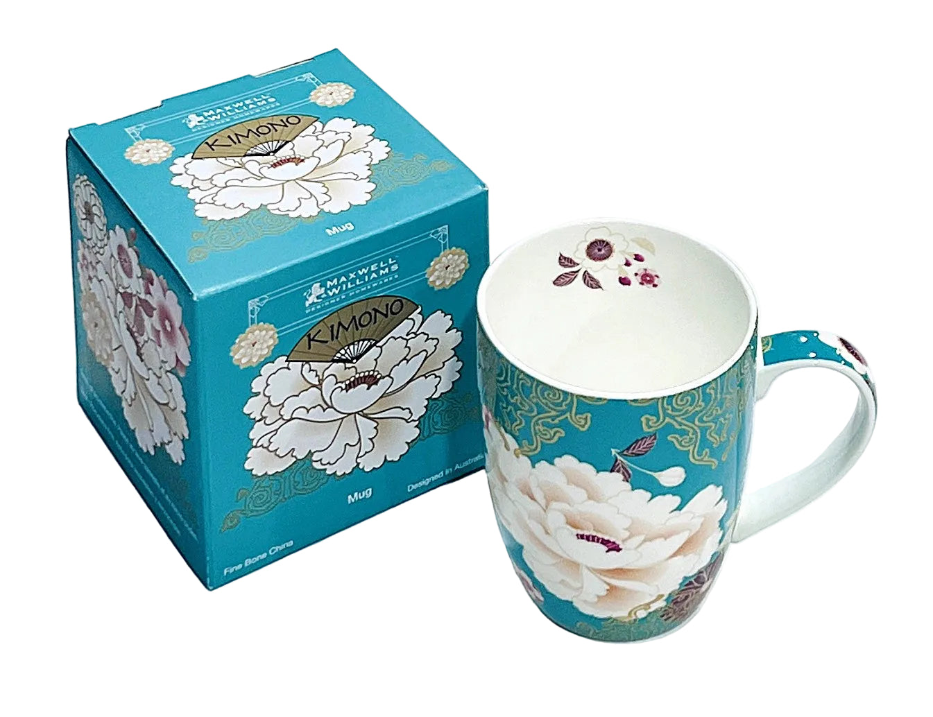 Teal mug with floral design and matching box on a white background