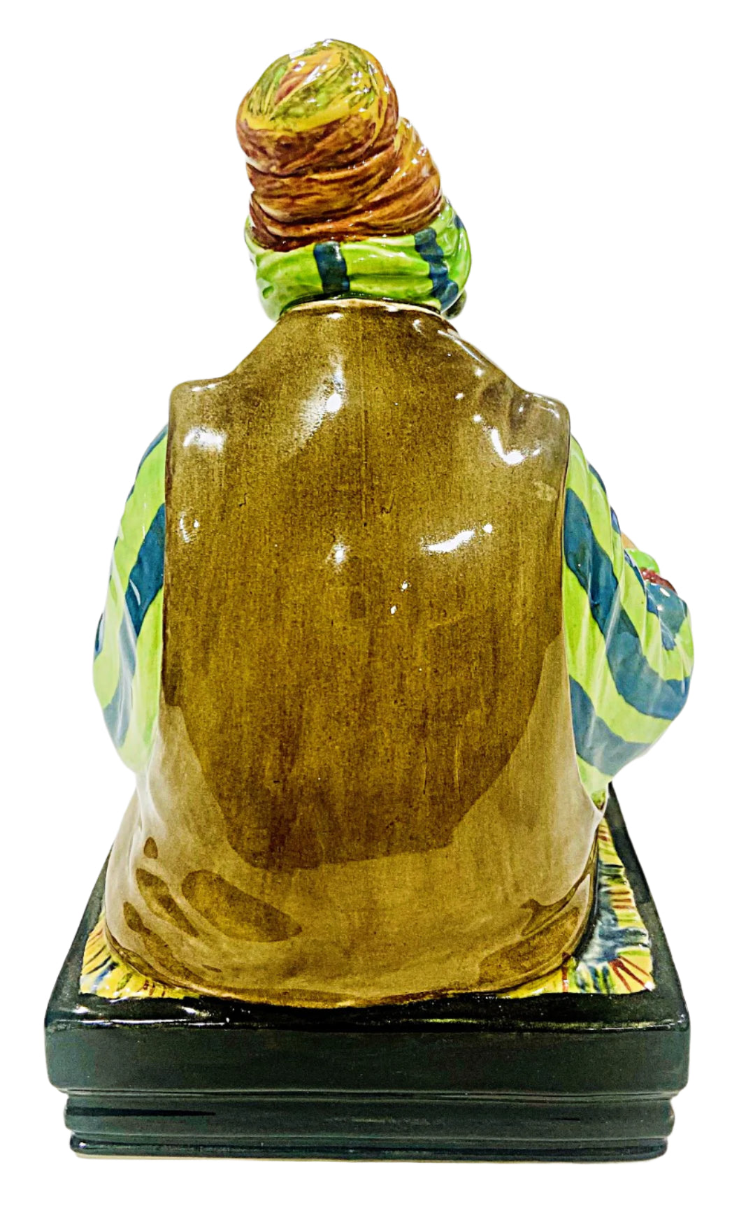 Colorful ceramic figure on a white background