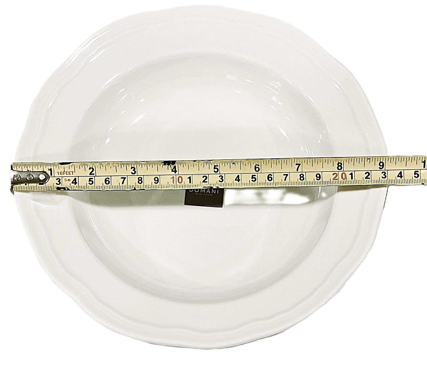 White soup bowl porcelain with a measuring tape indicating its 23cm diameter.