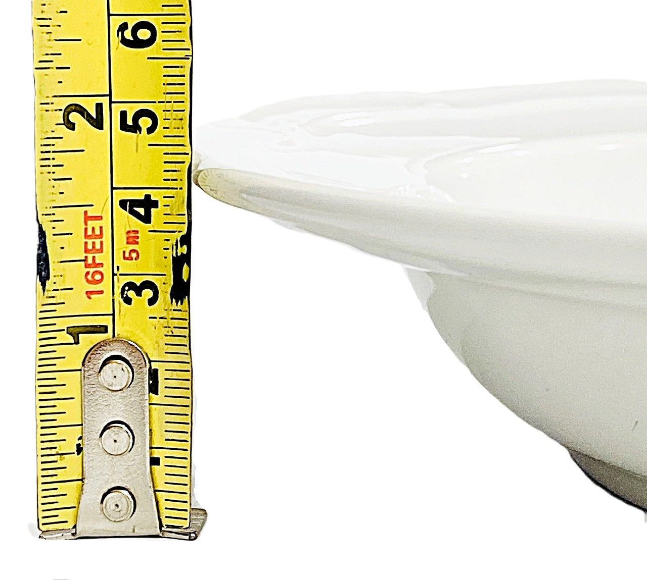 White soup bowl porcelain with a measuring tape indicating its 4.5cm depth.