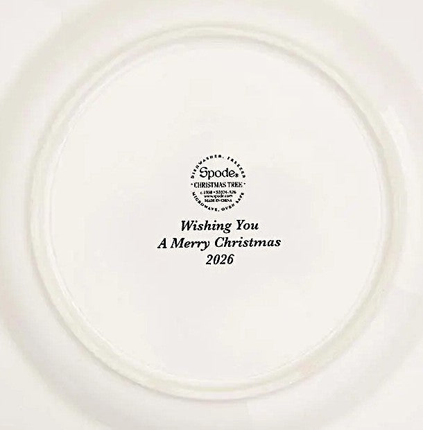 The bottom of a white ceramic plate featuring a black printed circular logo for Spode's Christmas Tree and the personalized text 'Wishing You A Merry Christmas 2026'.