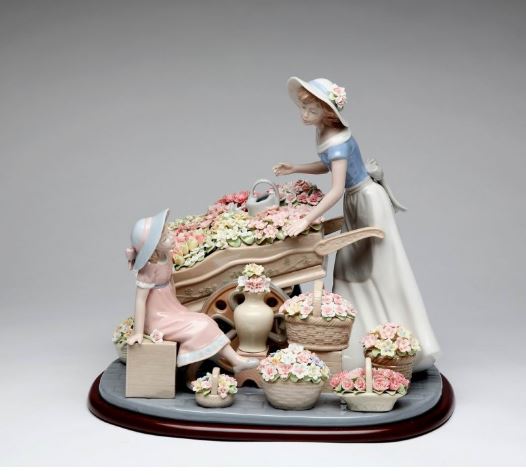 Cosmos Lady With Flower Wagon 12 1/2" - Royal Gift
