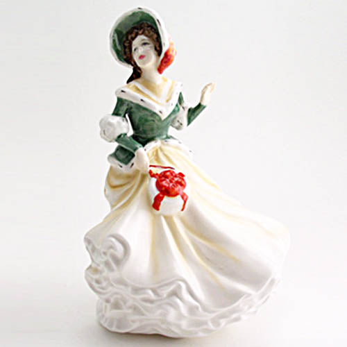 Royal Doulton Christmas day figurine hn4422 bone china hand made and painted in England